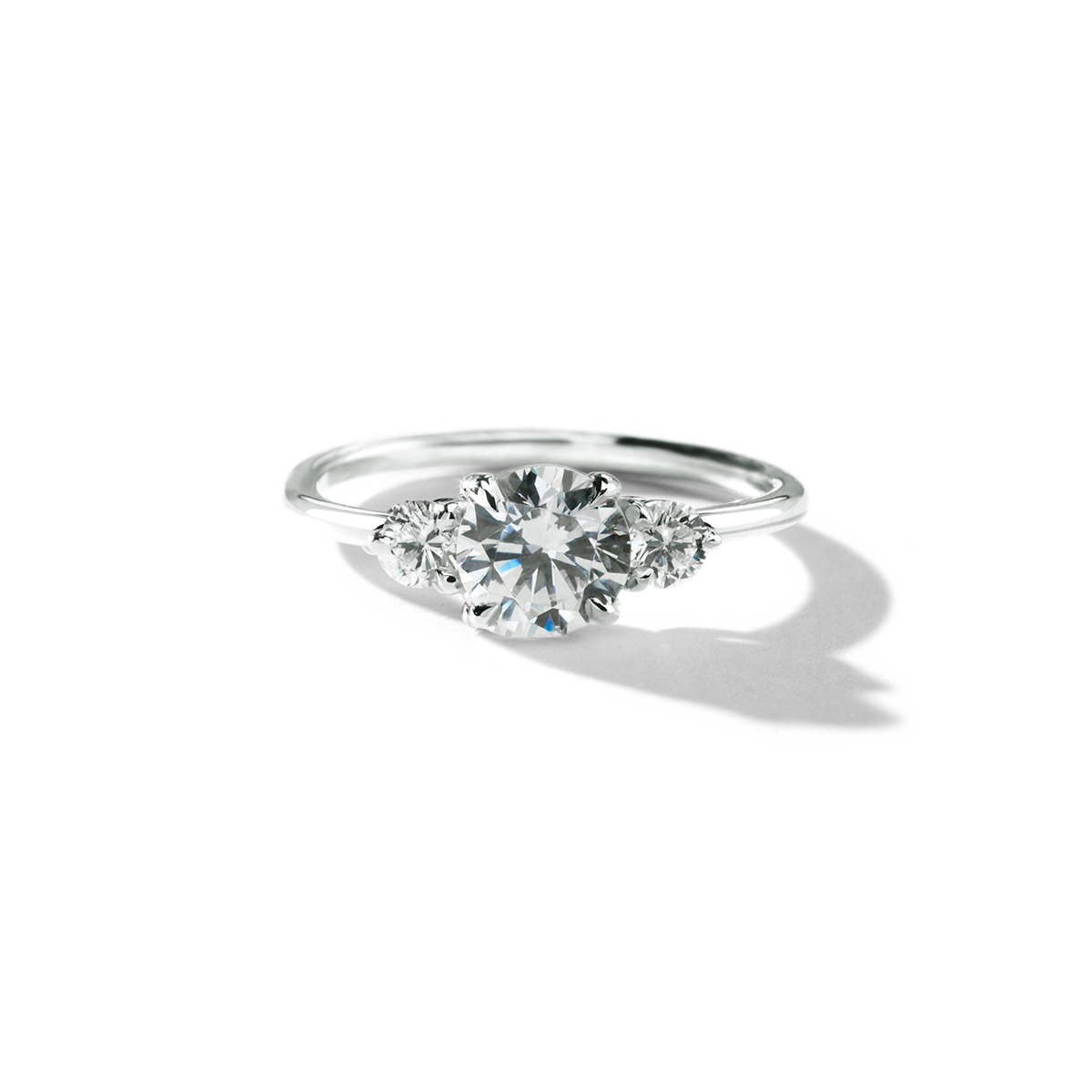 18K Gold Round Three Diamond Ring