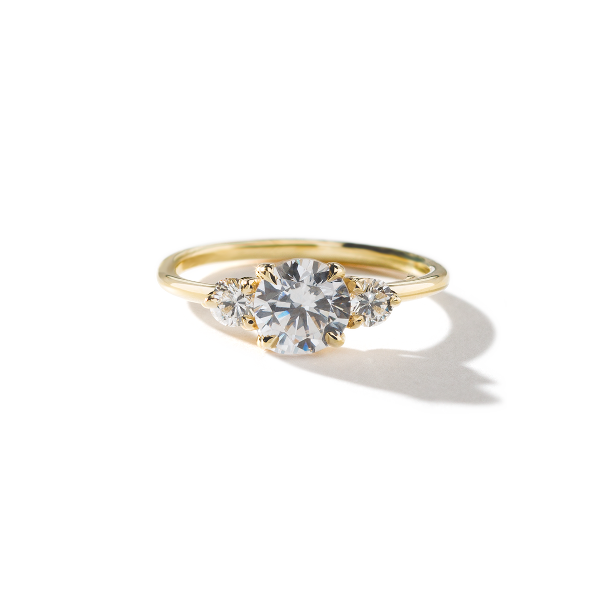 18K Gold Round Three Diamond Ring
