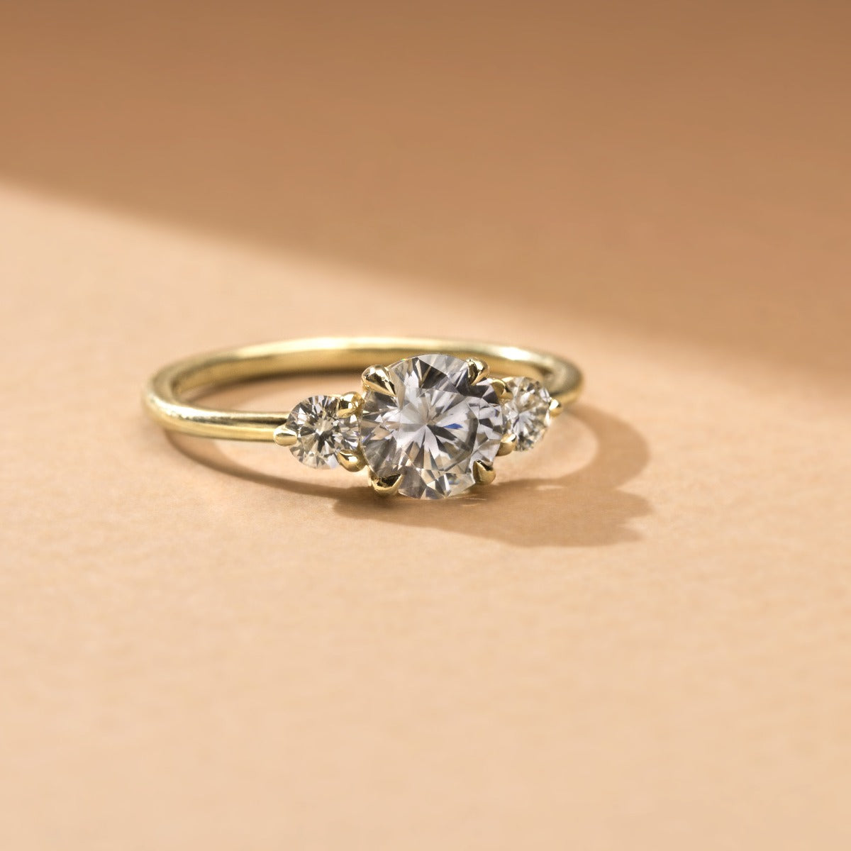 18K Gold Round Three Diamond Ring